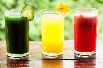 Colorful glasses of fruit and vegetable juice