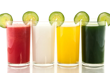 Colorful glasses of fruit and vegetable juice