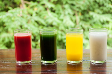 Fruit juce on wooden table