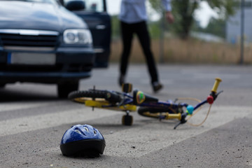 Car driver hitting little biker © Photographee.eu