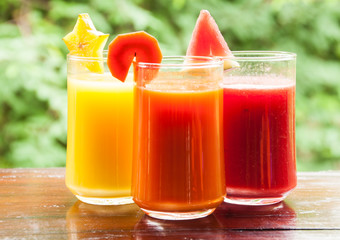 Colorful glasses of fruit juice