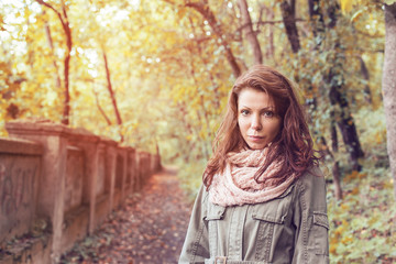 Park woman autumn path