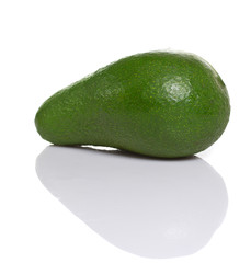 Fresh green avocado. Isolated on white background.