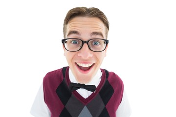Smiling geeky hipster looking at camera