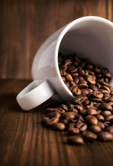 coffee beans in white cup close-up