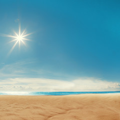 Fototapeta na wymiar Beach background. Blue sky, the sea, the sun shining. Spa resort