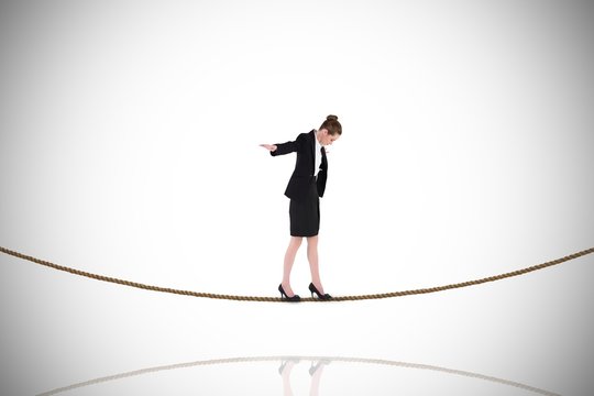 Businesswoman Performing A Balancing Act