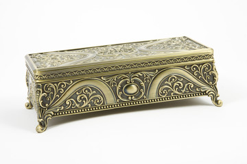 gold casket on a white background
