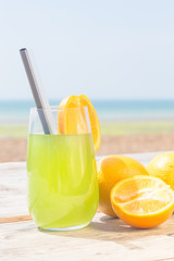 Refreshing fruity juice with the fresh lemon and orange