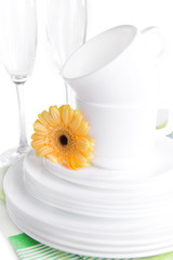 Set of white dishes close-up