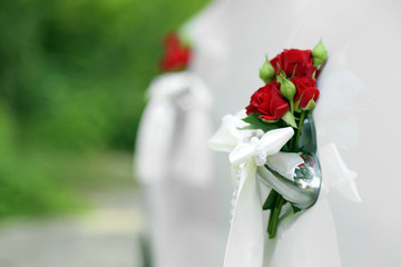 Wedding car decorated with flowers