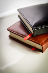 notebooks with red tab