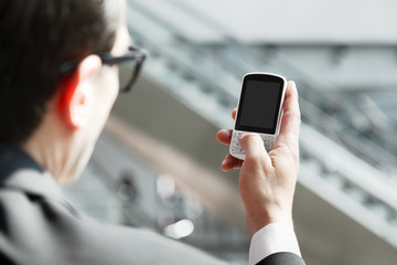 Close up of a man using cell phone