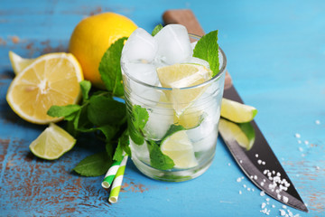 Fresh ingredients for mojito on old blue wooden table