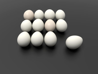 Dozen of eggs on black background