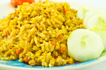 Fried rice on a plate on a white background