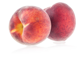 Two Fresh peaches isolated on white background