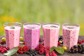 Various fresh berries smoothies