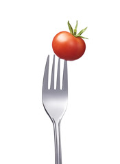 Kleine Tomate auf einer Gabel