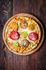 Pizza with tometoes and cheese