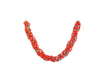 Close up with a colorful necklace isolated beautiful red green