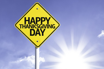 Happy Thanksgiving Day road sign with sun background