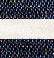 Navy blue striped denim texture.