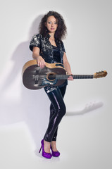 Fototapeta premium guitar woman player fashion