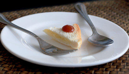 Sandwich bread on a plate and cutlery.