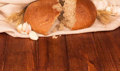 Bread loaf with garlic and wheat ears