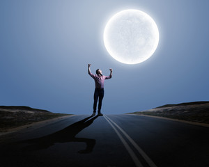 Man and full moon