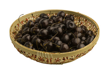 Ripe sweet cherry in a wattled cup