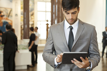 businessman working on the digital tablet