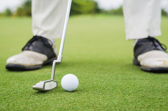 golf ball with the golf player