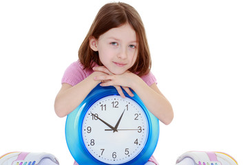 Girl with big round the clock