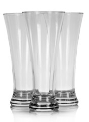 Three empty beer glasses