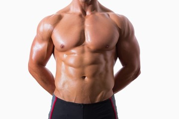 Fototapeta na wymiar Mid section of shirtless muscular man