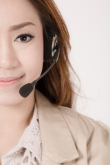 Portrait of happy smiling cheerful support phone operator in hea