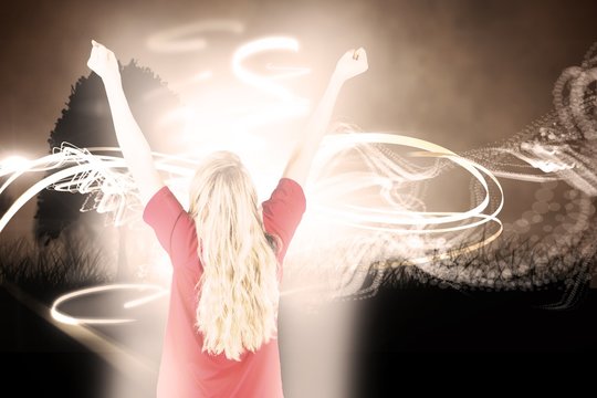 Composite image of cheering football fan in red - Powered by Adobe