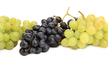 Fototapeta premium Bunch of white and black grapes.