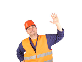 Worker in hard hat and vest.