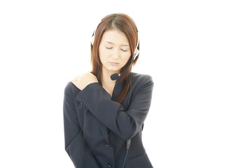 疲れた表情のオペレーター