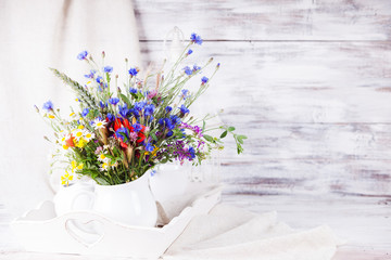 Wildflowers in bottles