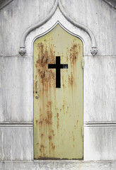 Cross rusty door