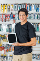 Man Showing Digital Tablet In Hardware Store