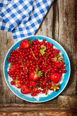 Ripe berries on a rural breakfast