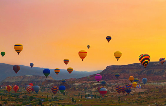 Hot air balloon landscape Hot air balloon flying mountain valley Göreme National Park and the Rocks Sites of Cappadocia Turkey