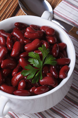 cooked red kidney beans with parsley vertical view from above