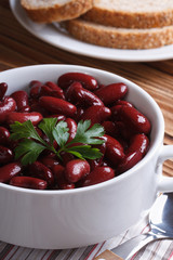 red beans boiled n white bowl close-up vertical