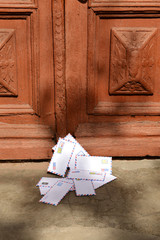 Letters on floor at front door